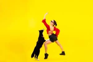 Dog dancing is a fun and expressive activity that showcases the harmony between dog and handler through music and movement.